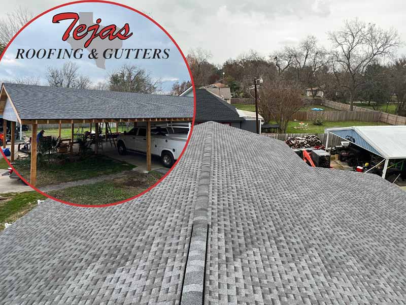 Top view of a carport with brand new GAF HDZ Pewter Grey shingles installed by Tejas Roofing & Gutters